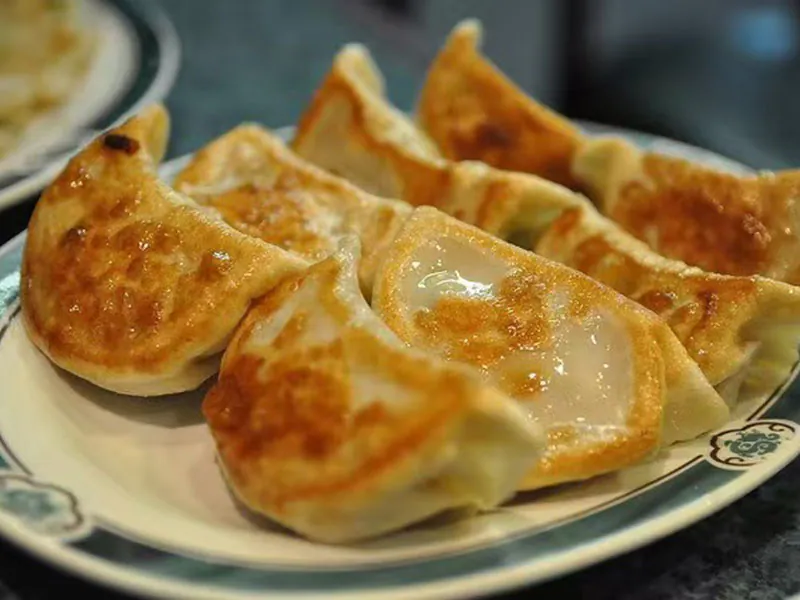 Golden crispy pan-fried dumplings at Panda Buffet, a Buffet Restaurant in Cushing